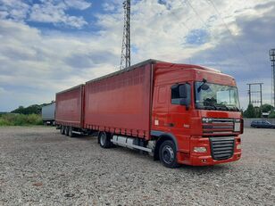 شاحنة ذات أغطية جانبية DAF + مقطورة ستارة